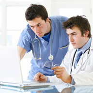 Image of a man on his laptop